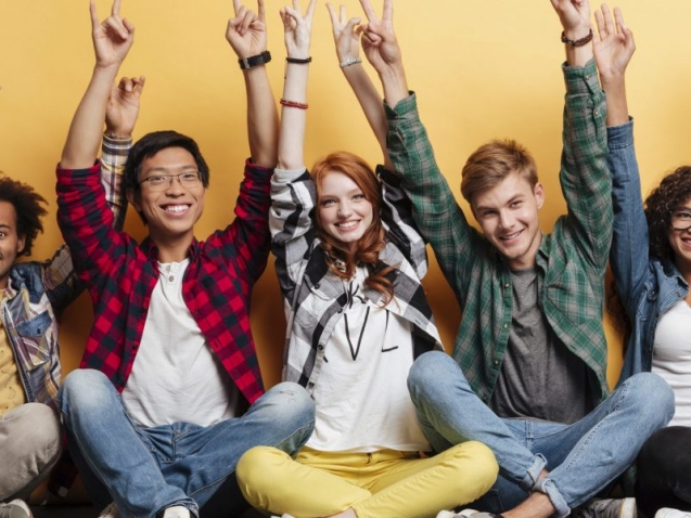 graphicstock-multiethnic-group-of-smiling-young-people-sitting-and-celebrating-success-with-raised-hands_H_RJw_I2l-scaled-1170x600